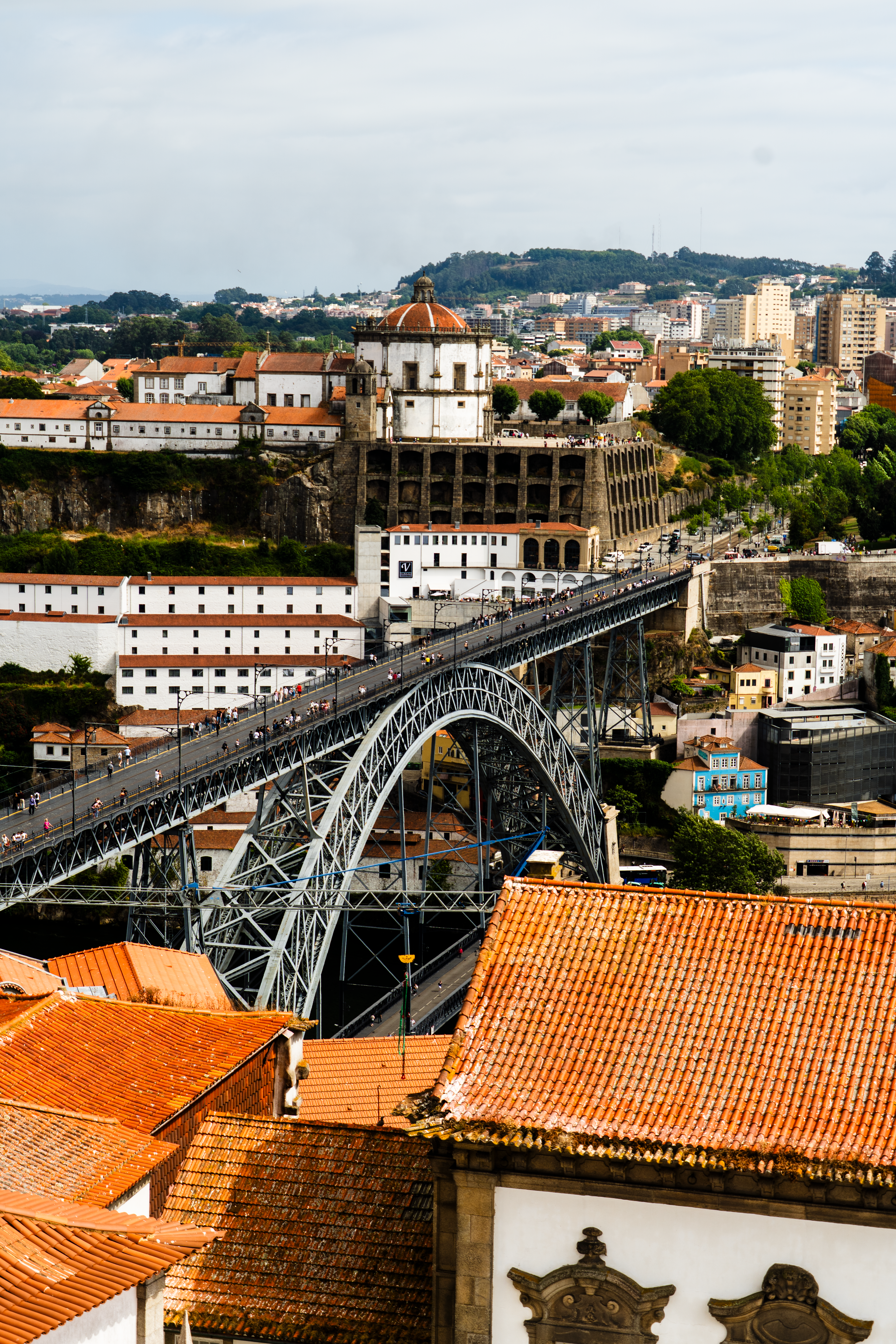 A stunning view of the iconic Dom Luís I Bridge spanning the Douro River in Porto, Portugal.