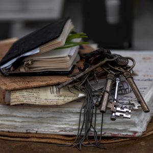 Vintage keys and journals still life — photo by Danyale R Zink on Pexels