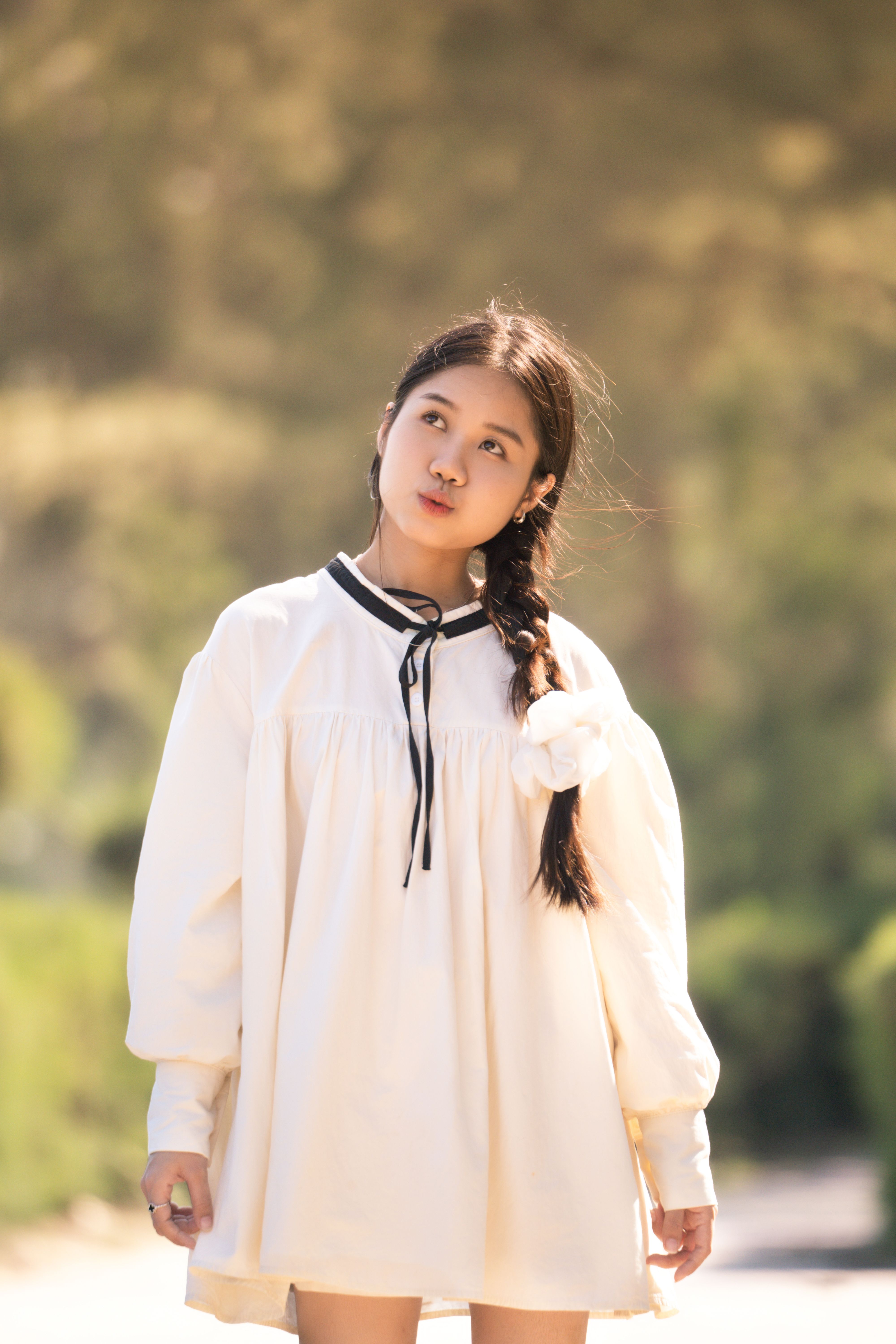 Young Girl in White Dress Outdoors · Free Stock Photo