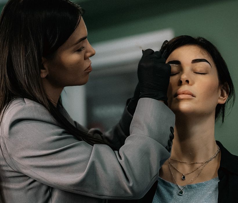 Eyeshadow being applied during a makeup session