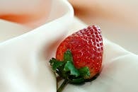 Close-up of Fresh Strawberry on Satin