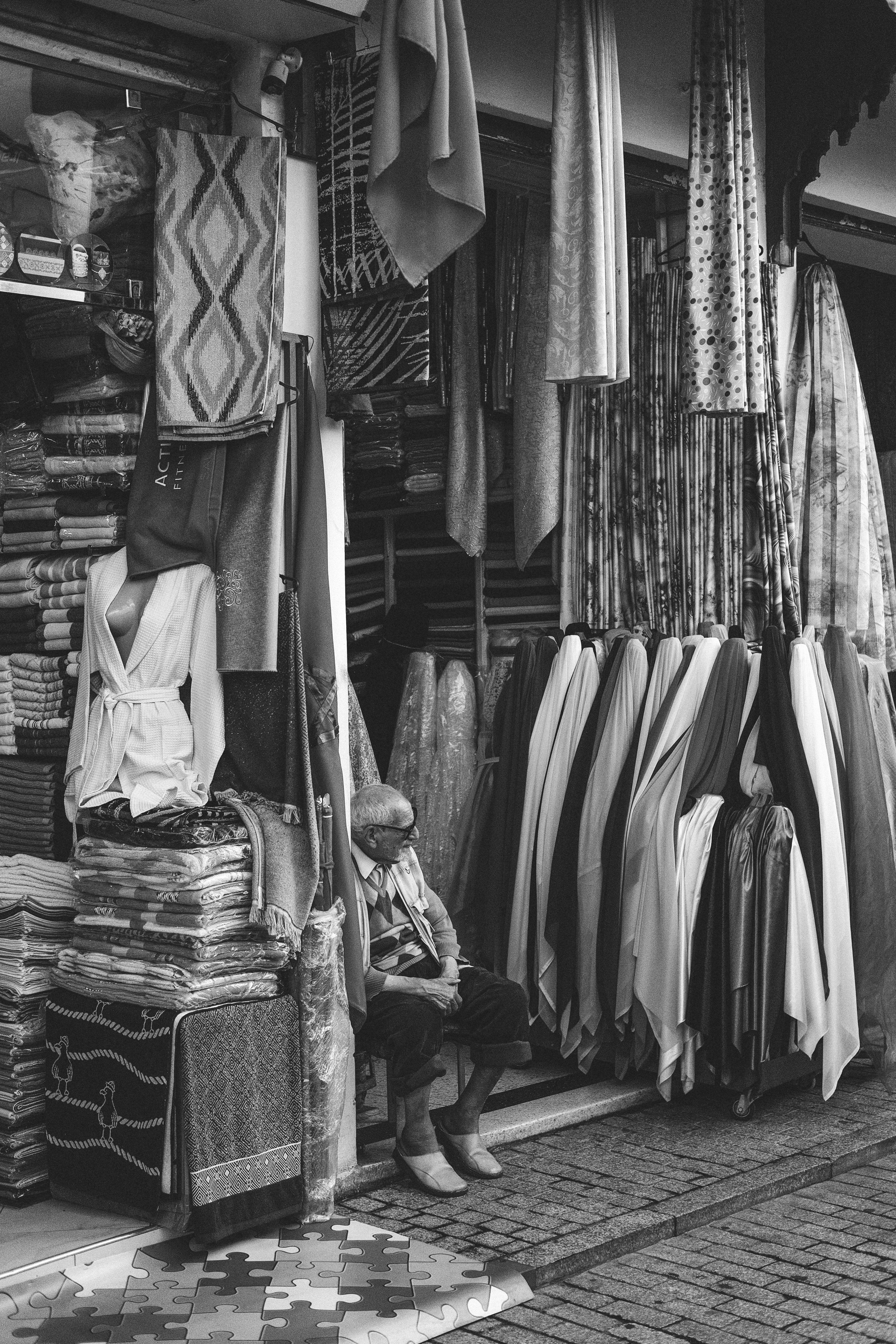 Fabric shop scene in Rabat Medina.