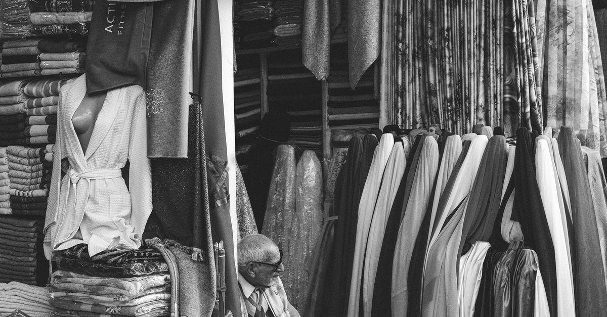 Fabric shop scene in Rabat Medina.
