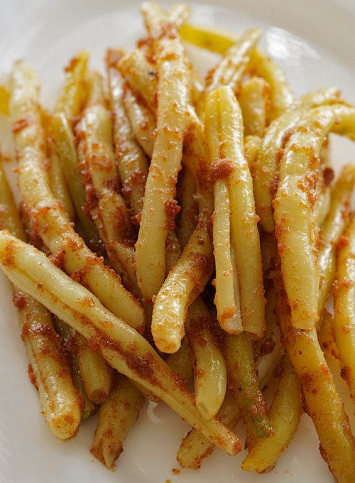 Free A delicious serving of golden brown french fries on a white plate. Stock Photo