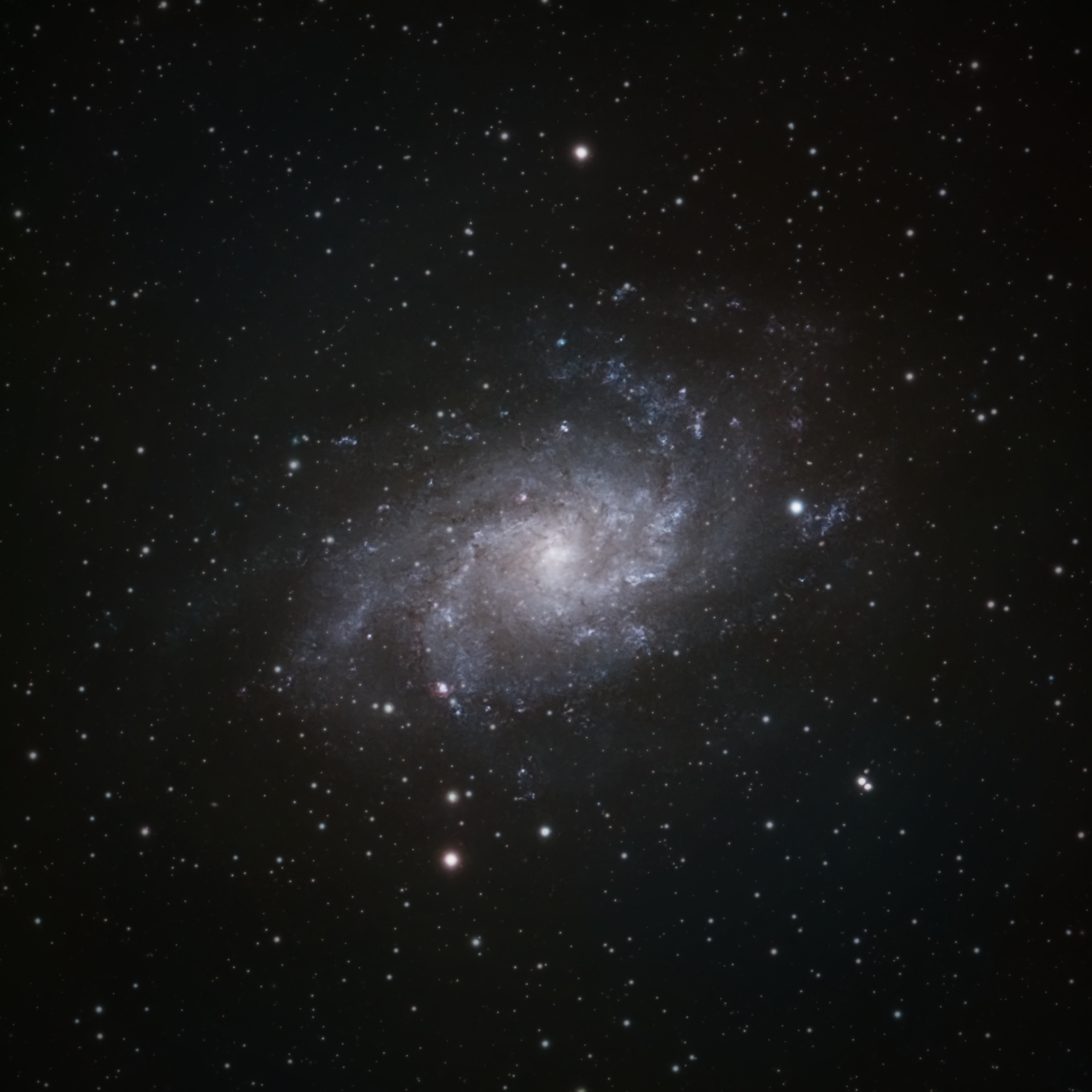 Breathtaking image of a spiral galaxy surrounded by countless stars, captured from São Pedro de Alcântara, Brasil.