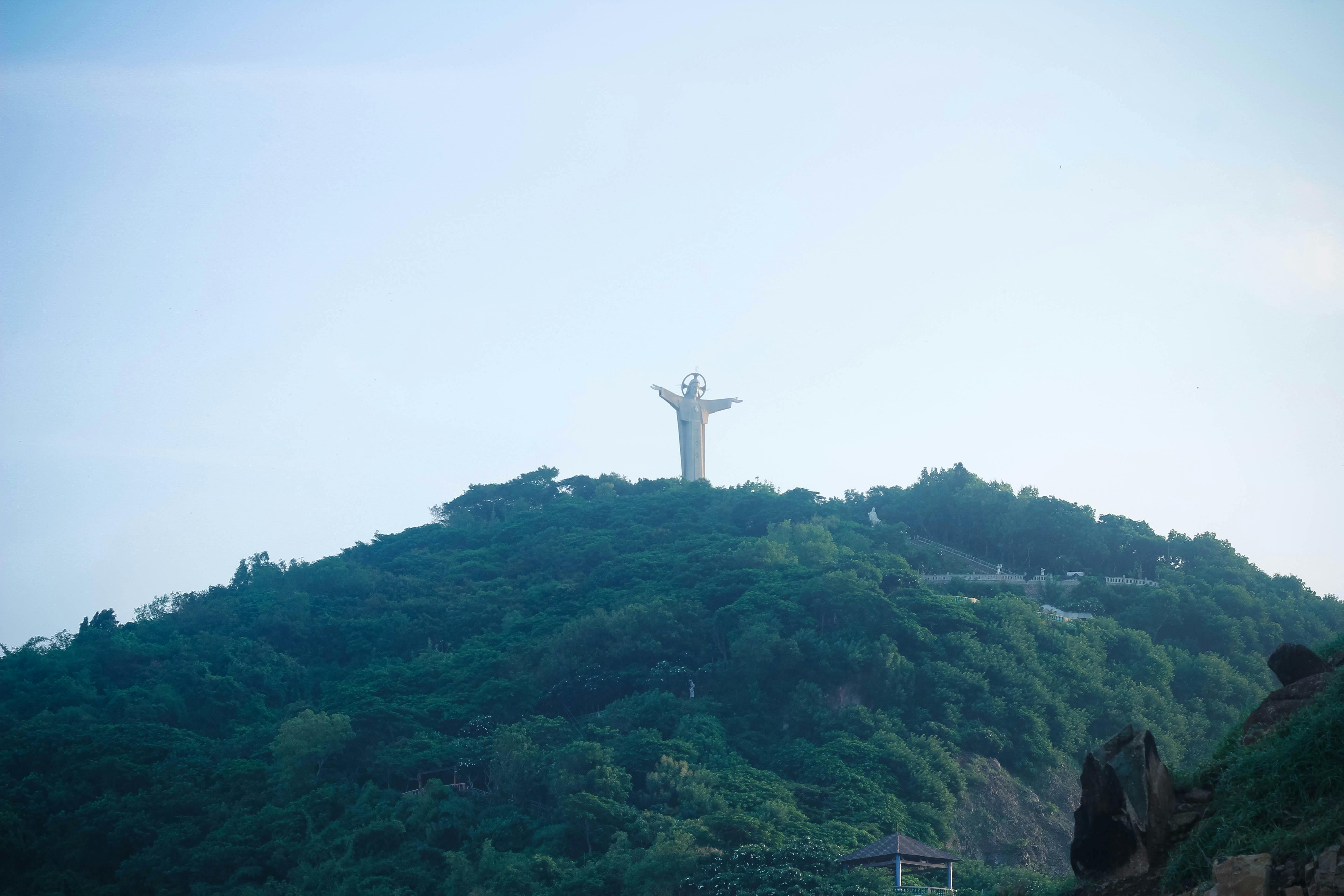 A scenic view of the Jesus Christ statue atop Nui Nho Mountain in Vũng T à u, Vietnam.