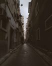 Narrow street with old residential buildings
