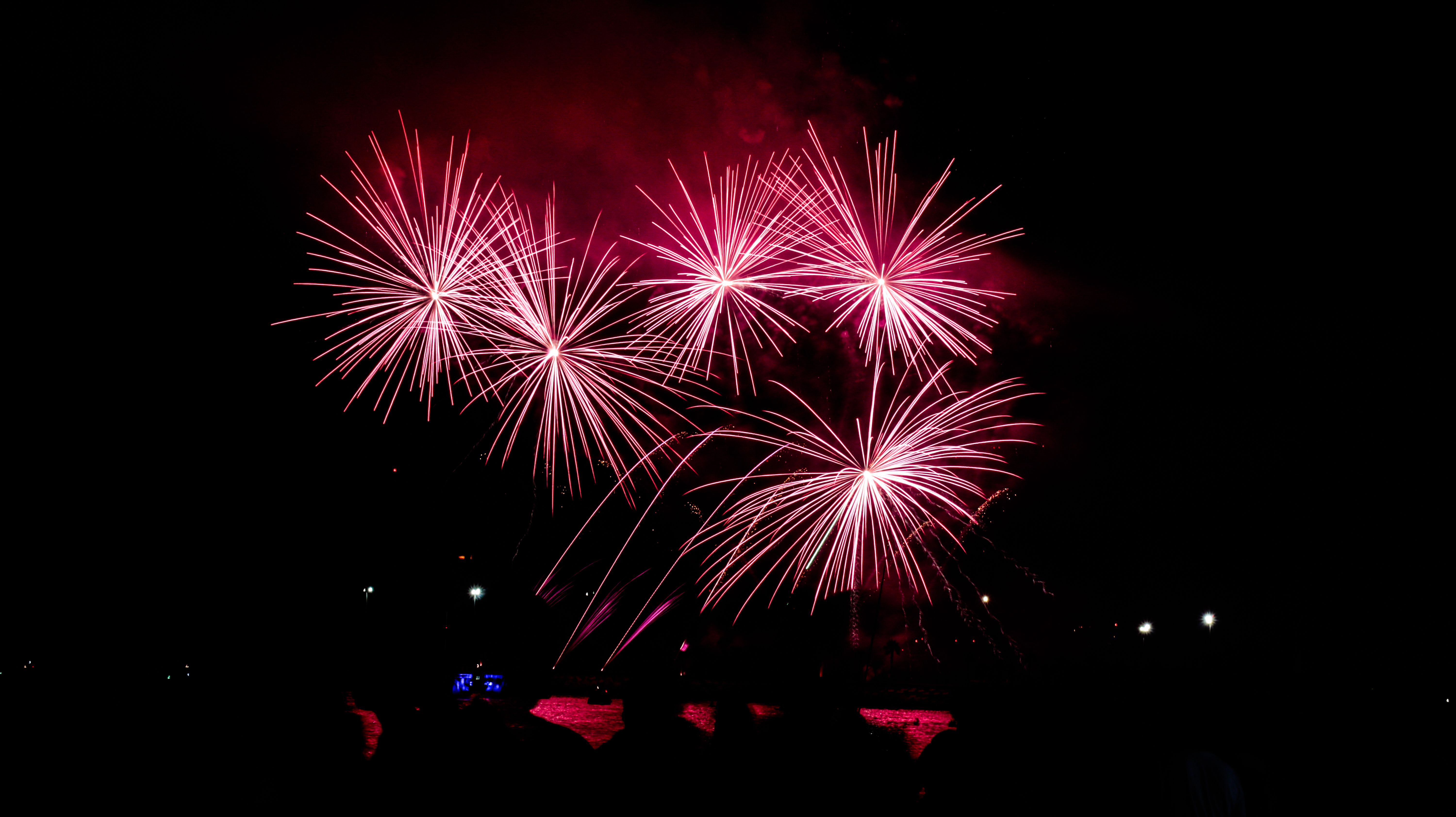 Captivating fireworks light up the night sky in Málaga, Spain, creating a vibrant spectacle. - Málaga