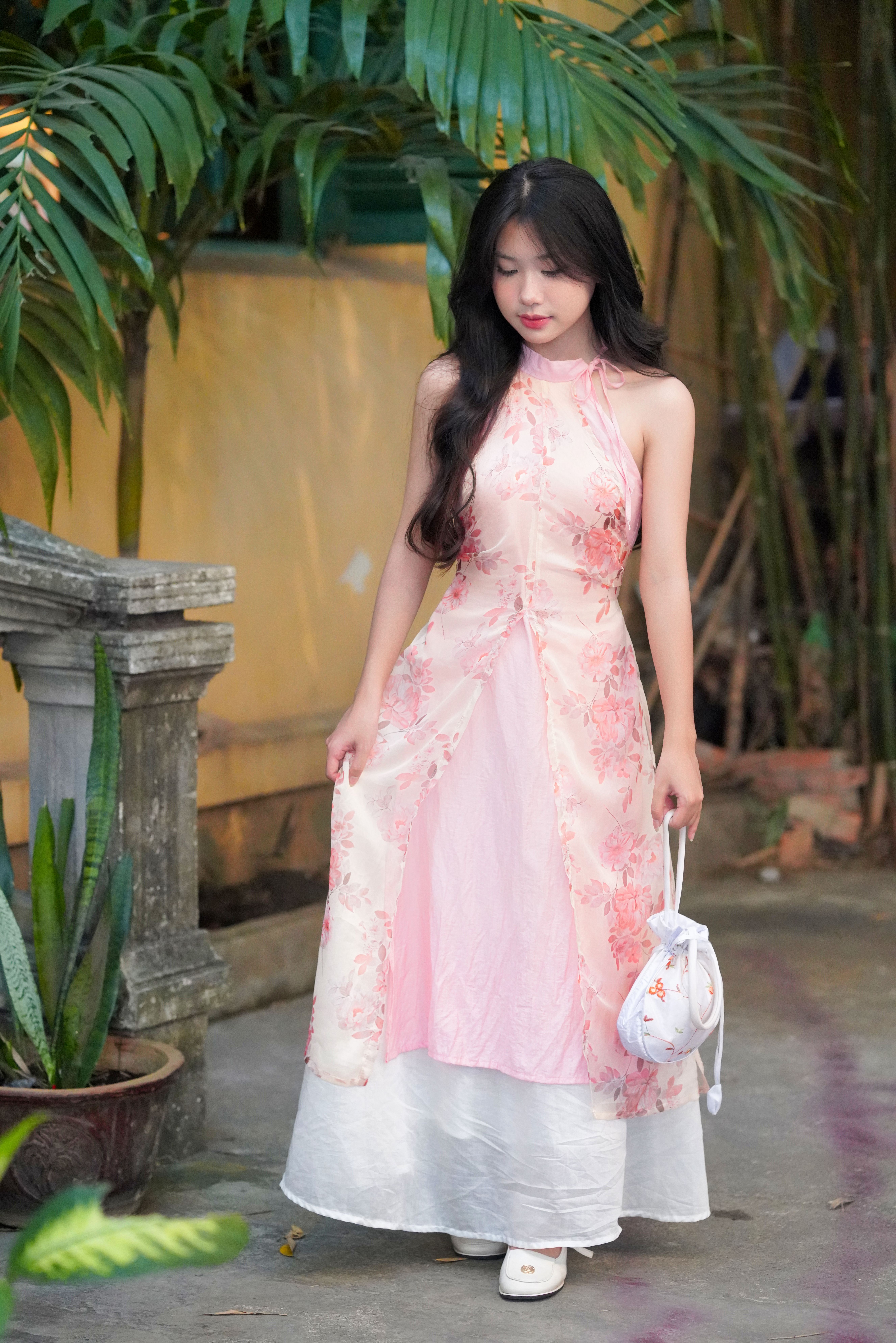 Elegant Woman in Traditional Pink Dress Outdoors · Free Stock Photo