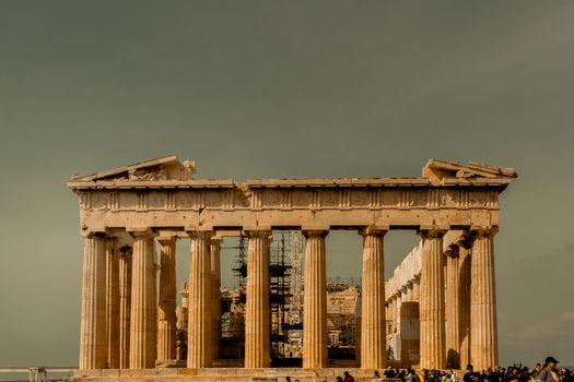 The iconic Parthenon temple bathed in warm light at the Acropolis of Athens, Greece.