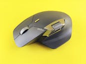 Ergonomic Wireless Mouse on Yellow Background