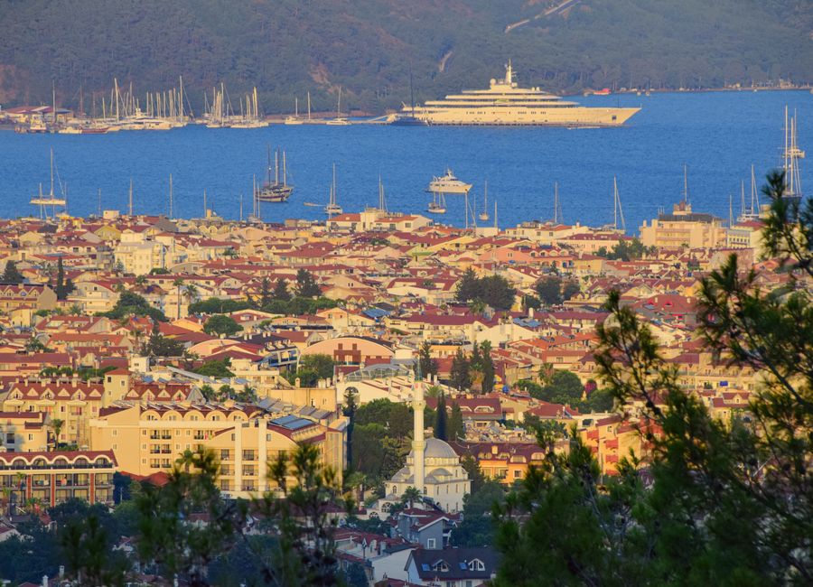 Picturesque vista of Marmaris cityscape, featuring vibrant rooftops and yachts in the harbor.