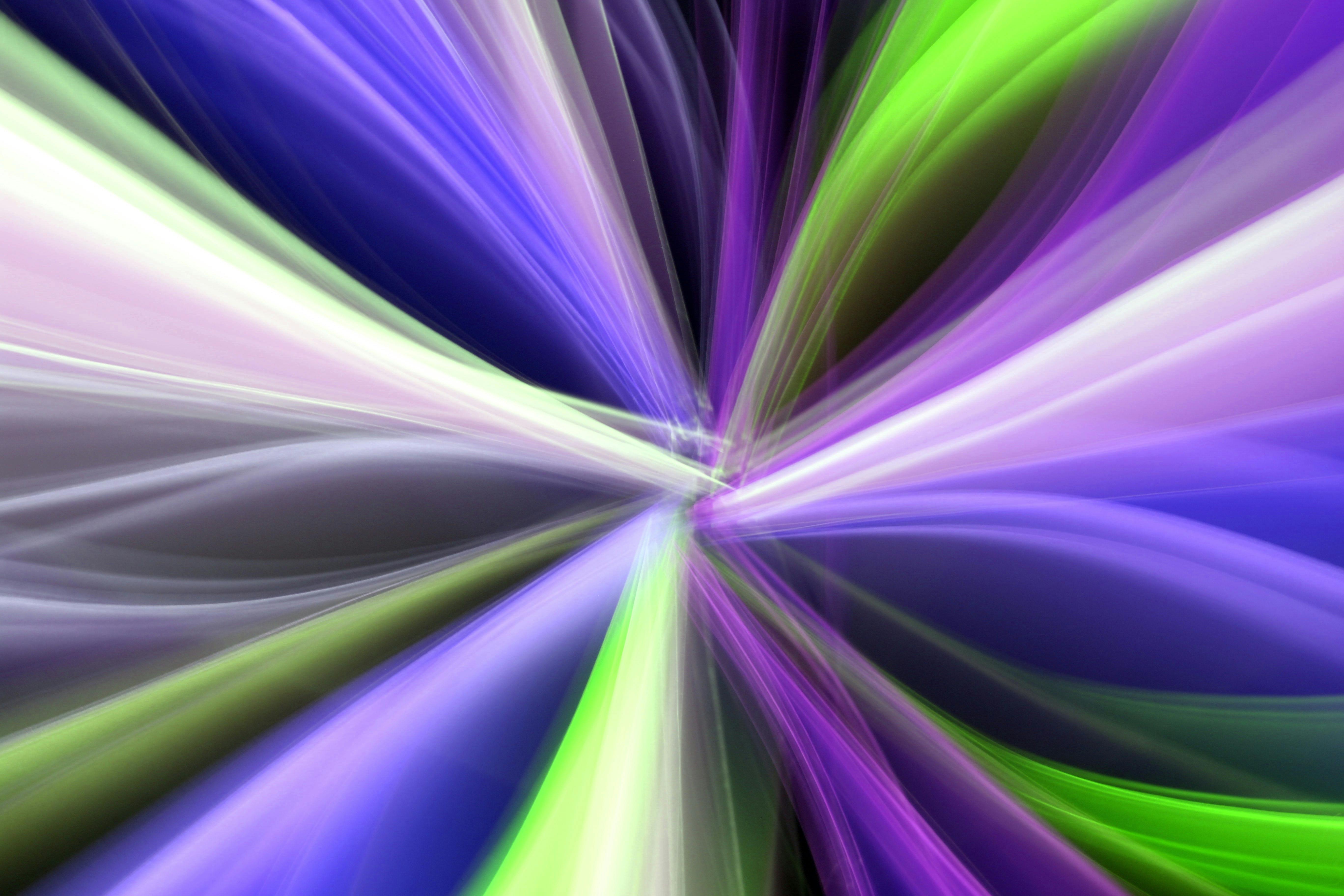 Colorful abstract light streaks creating dynamic motion and vibrant energy.