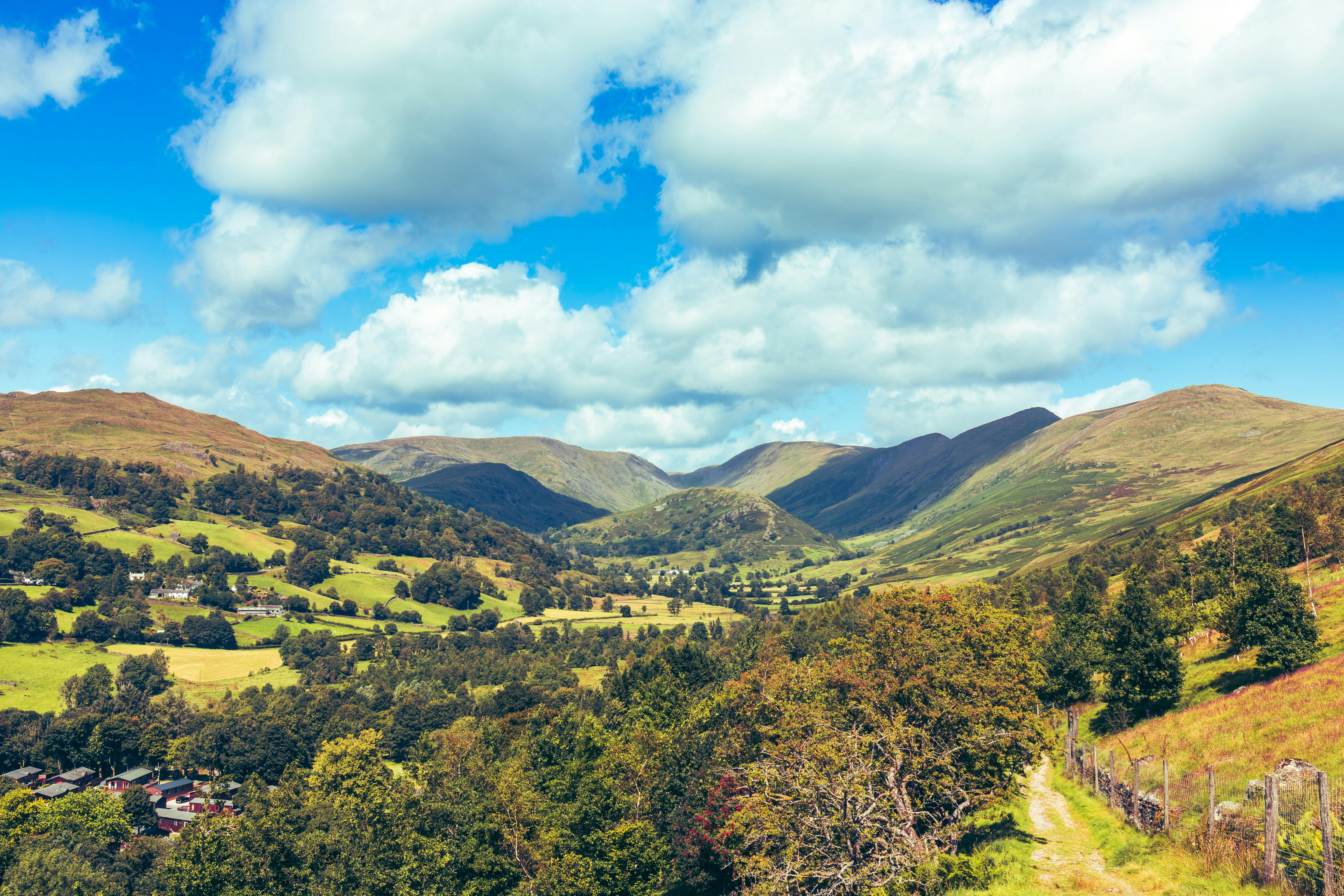 Explore the lush landscapes and rolling hills of Troutbeck Valley, England's serene countryside destination.