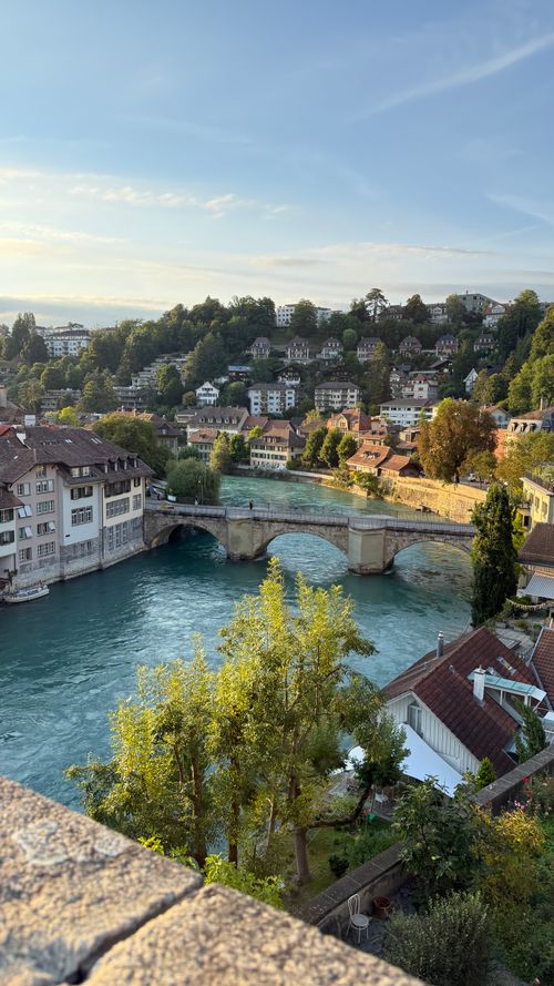 Free Scenic view of Bern, Switzerland, featuring historic bridge and river with charming architecture. Stock Photo