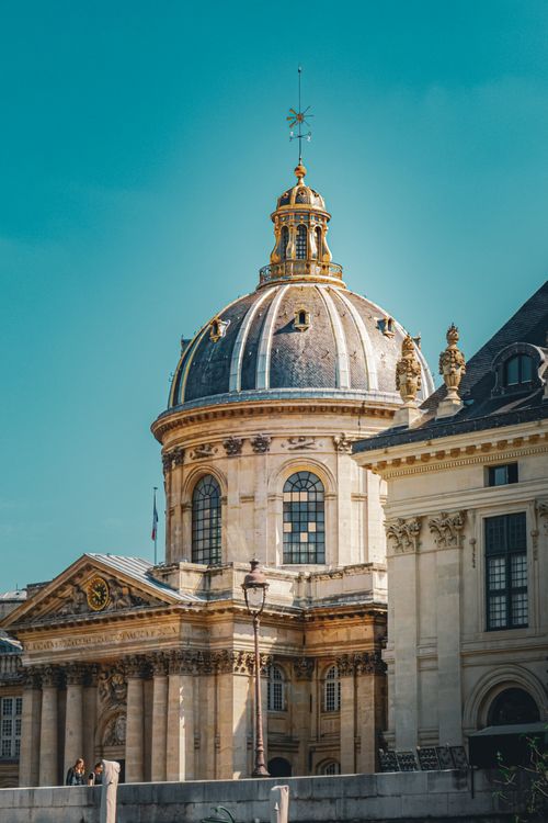 Free Stunning view of the Institut de France dome against a clear blue sky in Paris, France. Stock Photo