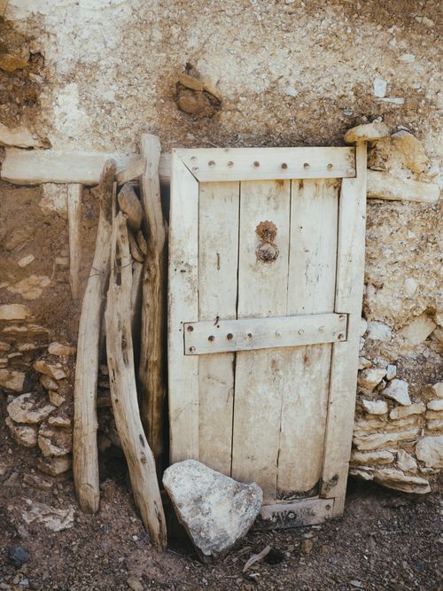 Free Weathered wooden door with rustic charm in Taroudant, Morocco. Stock Photo