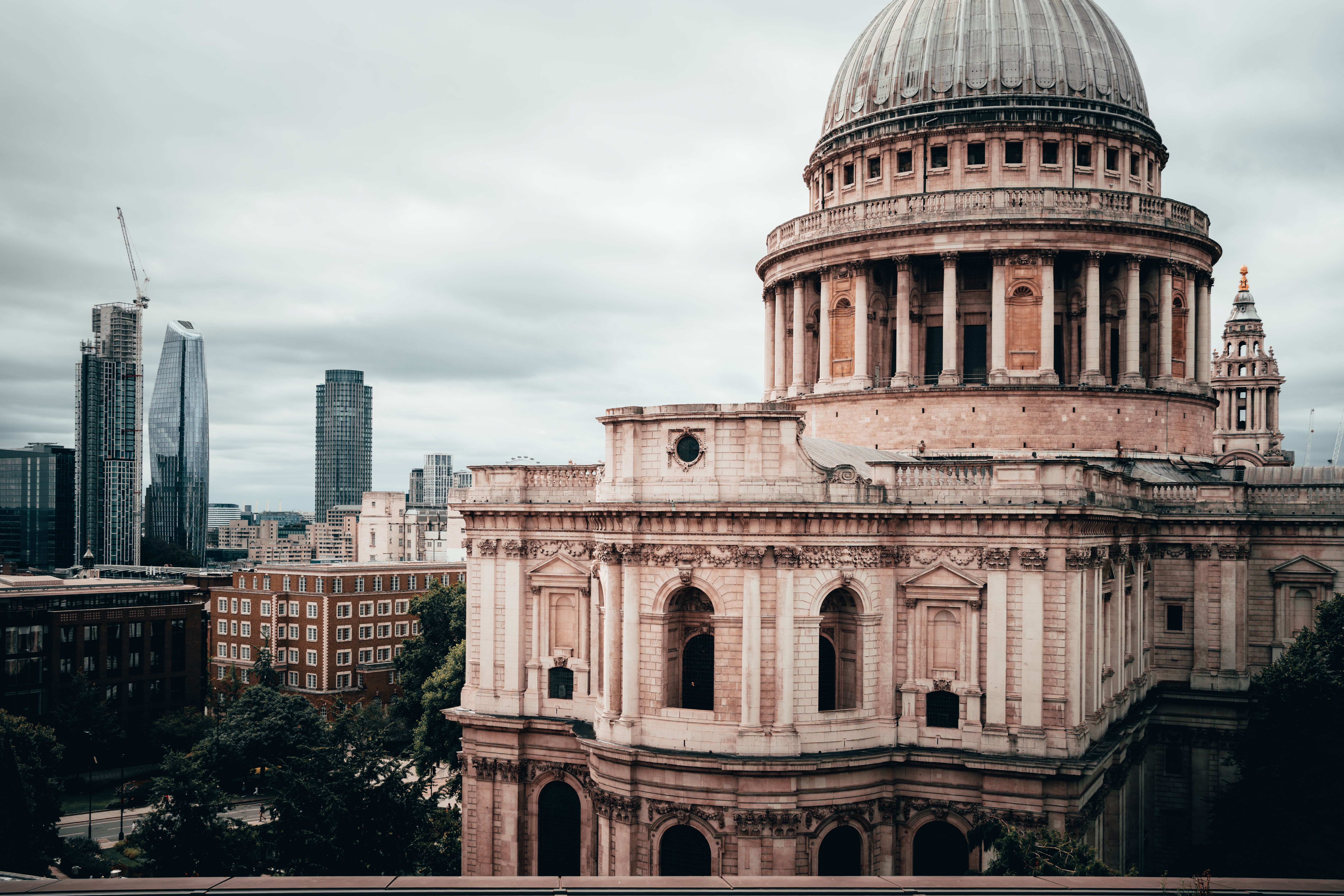 View of St Paul's Cathedral and the London skyline on a cloudy day.