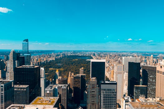 A stunning aerial view of the New York City skyline featuring Central Park and iconic skyscrapers.
