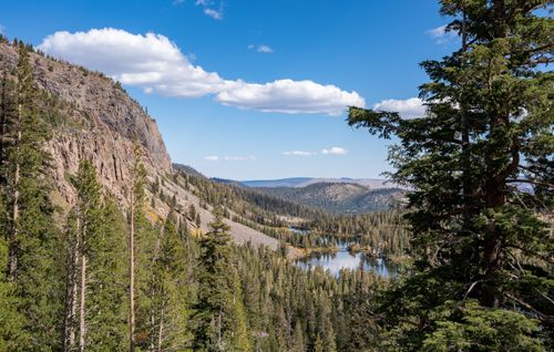 Free Breathtaking landscape view showcasing Mammoth Lakes surrounded by Sierra Nevada mountains under a clear blue sky. Stock Photo