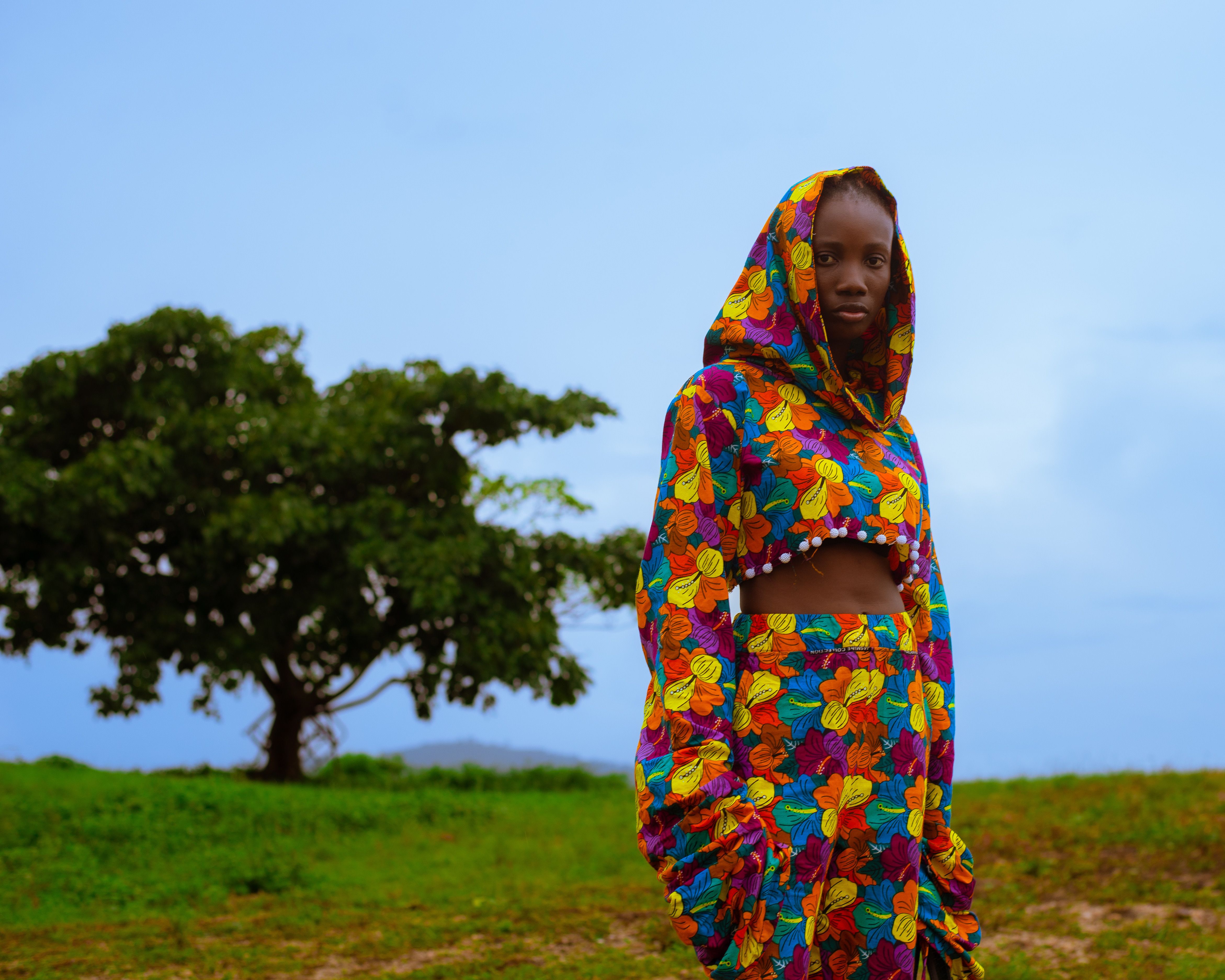 Person Solid Color Portrait of Woman in Colorful Clothes and Skirt · Free Stock Photo