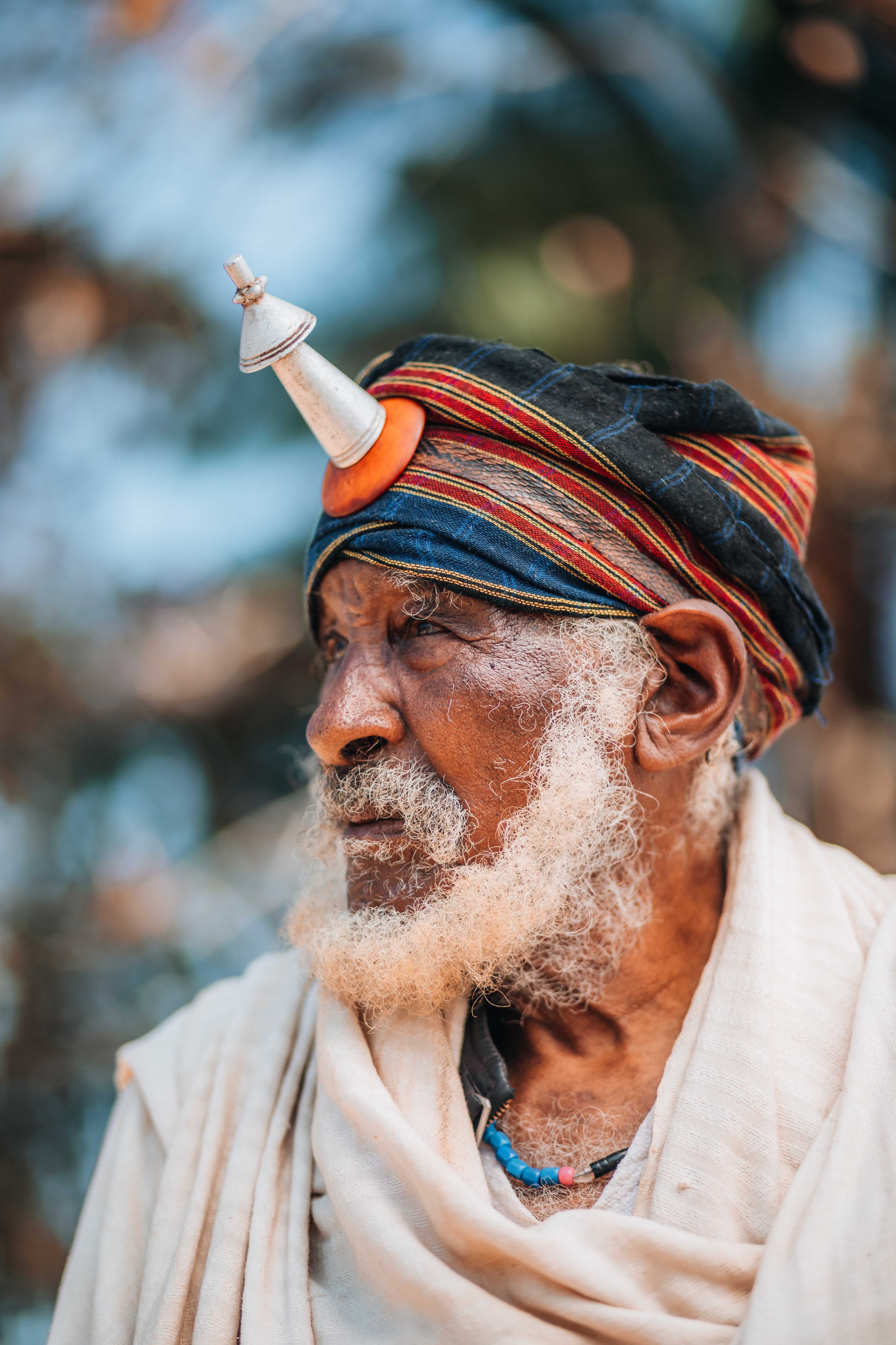 Elderly Man in Traditional Clothing Outdoors · Free Stock Photo