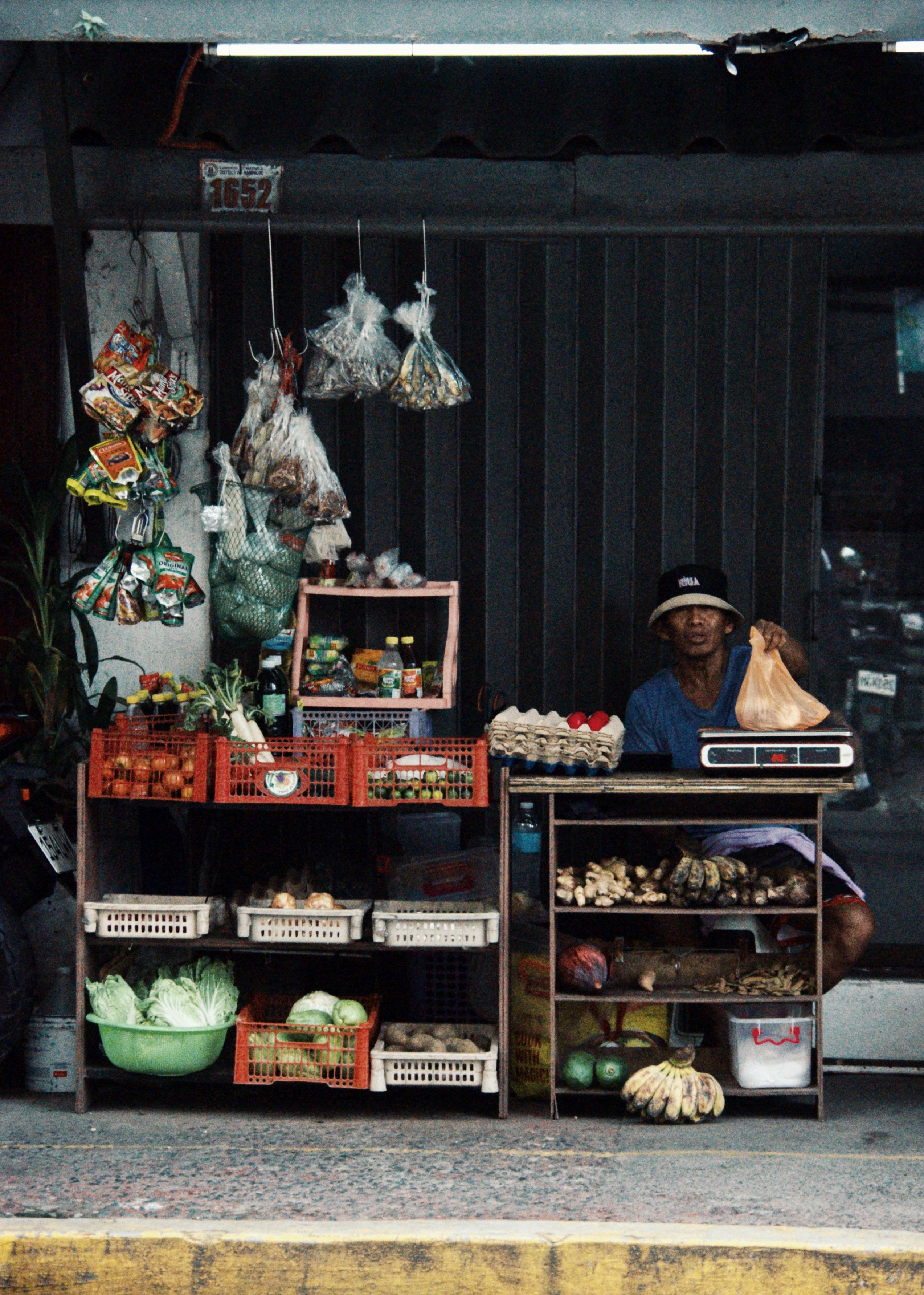 Street Vendor Market Stall with Produce Display · Free Stock Photo