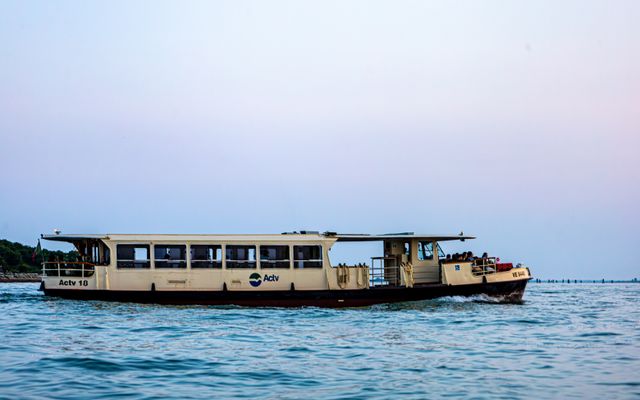 Photo: Regan Dsouza on Pexels A scenic view of a public water bus cruising through the Venetian Lagoon during sunset in Venice, Italy.