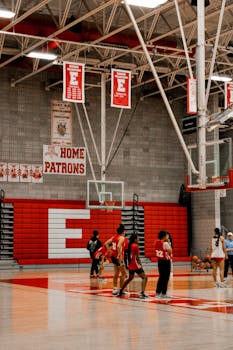 High school basketball team practicing in Salt Lake City gym.