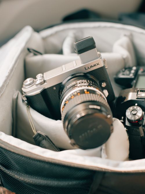 Free Close-up of a professional camera secured in a padded travel case, ready for photography adventures. Stock Photo
