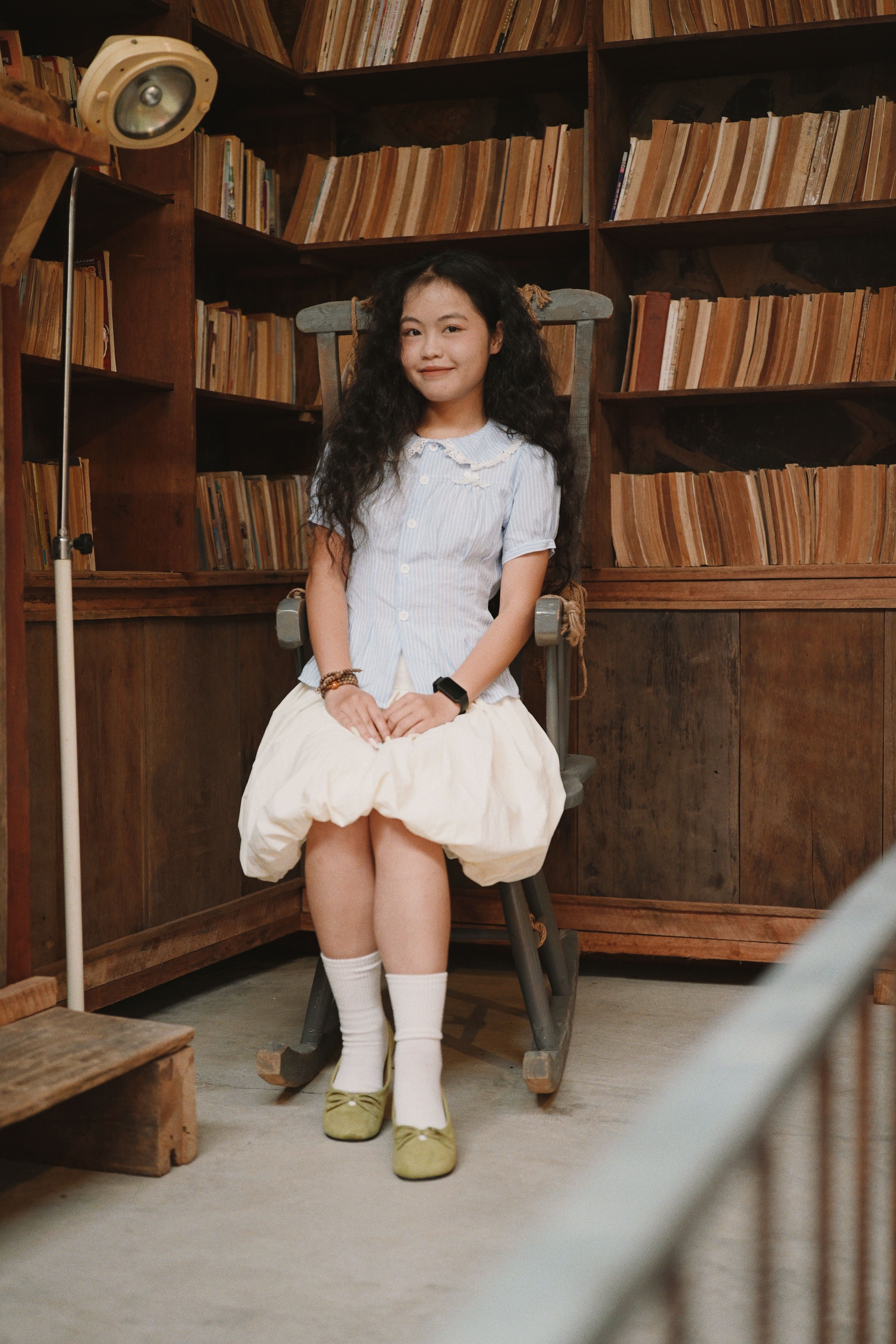 Young Woman Posing in Vintage Library Setting · Free Stock Photo