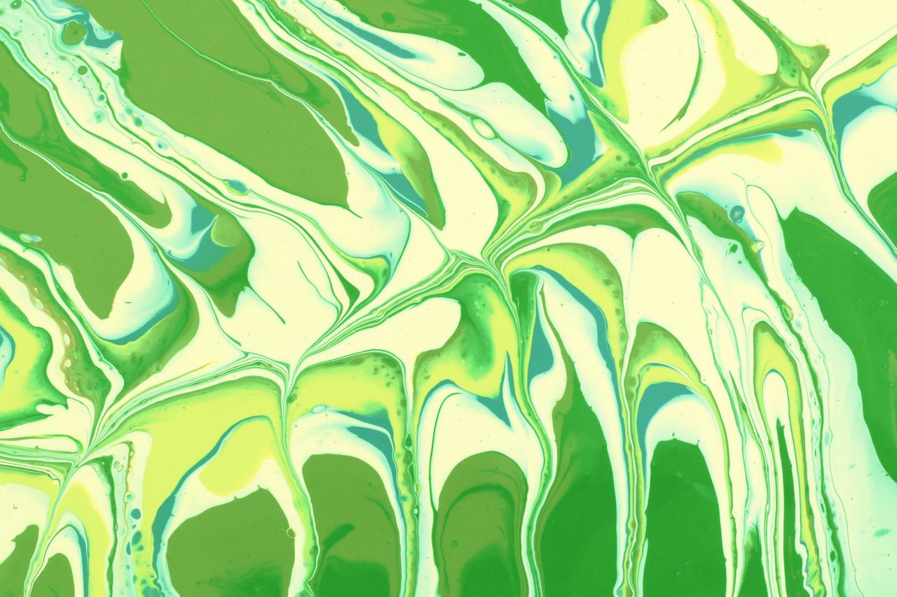 vibrant abstract green and yellow fluid art with flowing patterns and