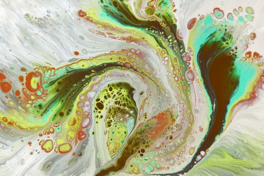 Dynamic abstract paint pattern featuring vivid swirls of color and texture.