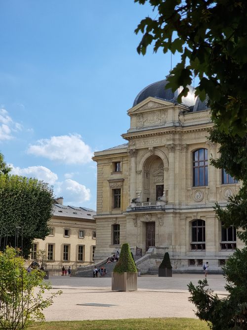 Free Elegant historic building at Jardin des Plantes in Paris, perfect for architectural and travel themes. Stock Photo