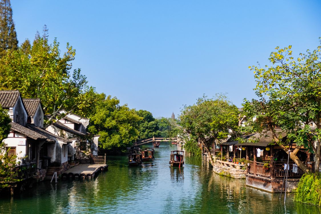 Rustic Chinese Scene Serene Canal Scene in Traditional Chinese Village · Free Stock Photo