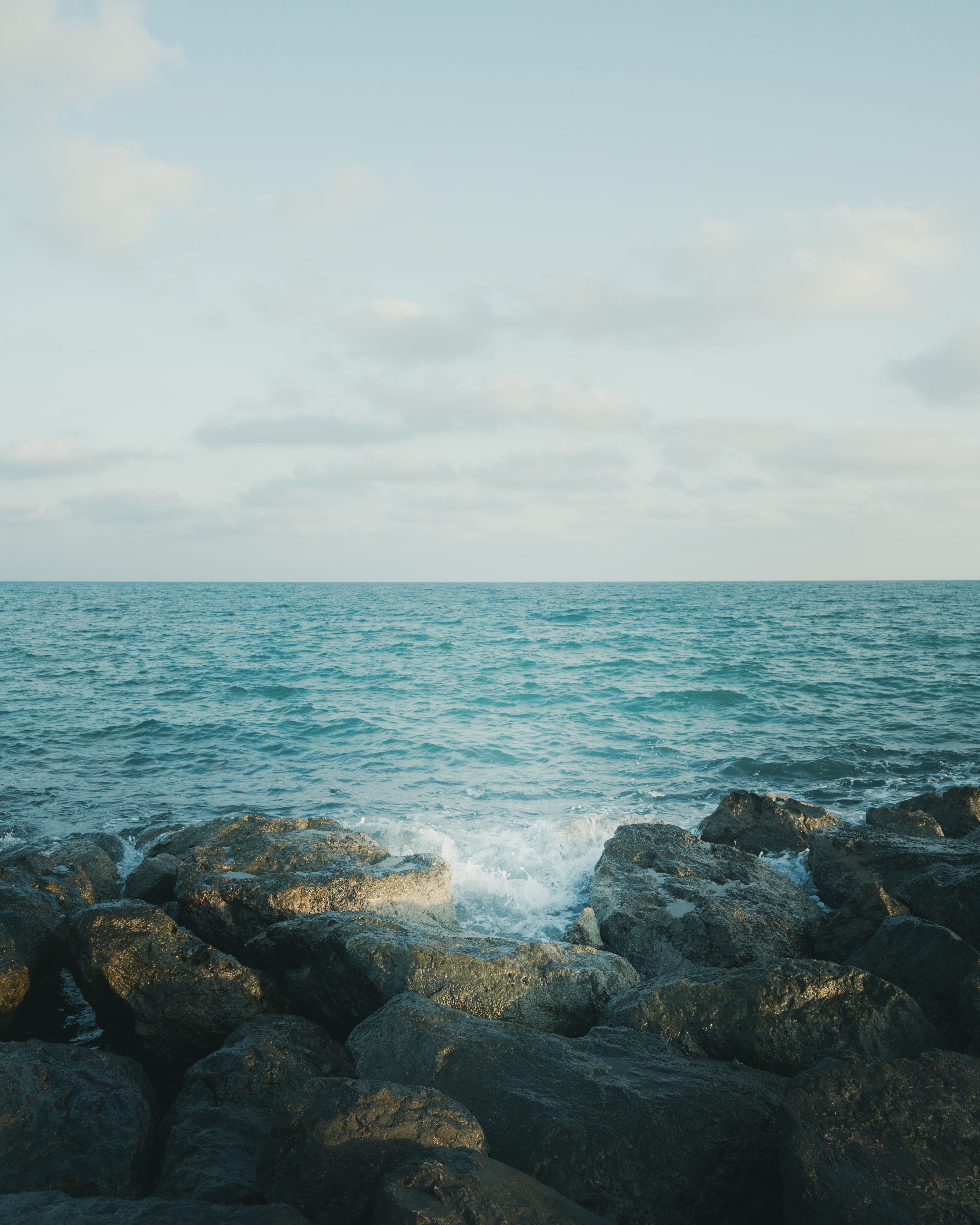 Tranquil ocean view with rocky shoreline at Karataş in sunny Türkiye.