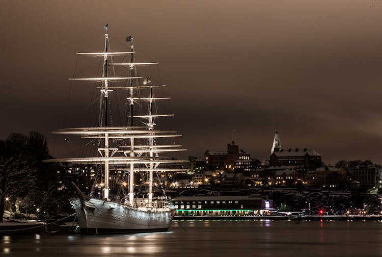 White Ship On Port At Night