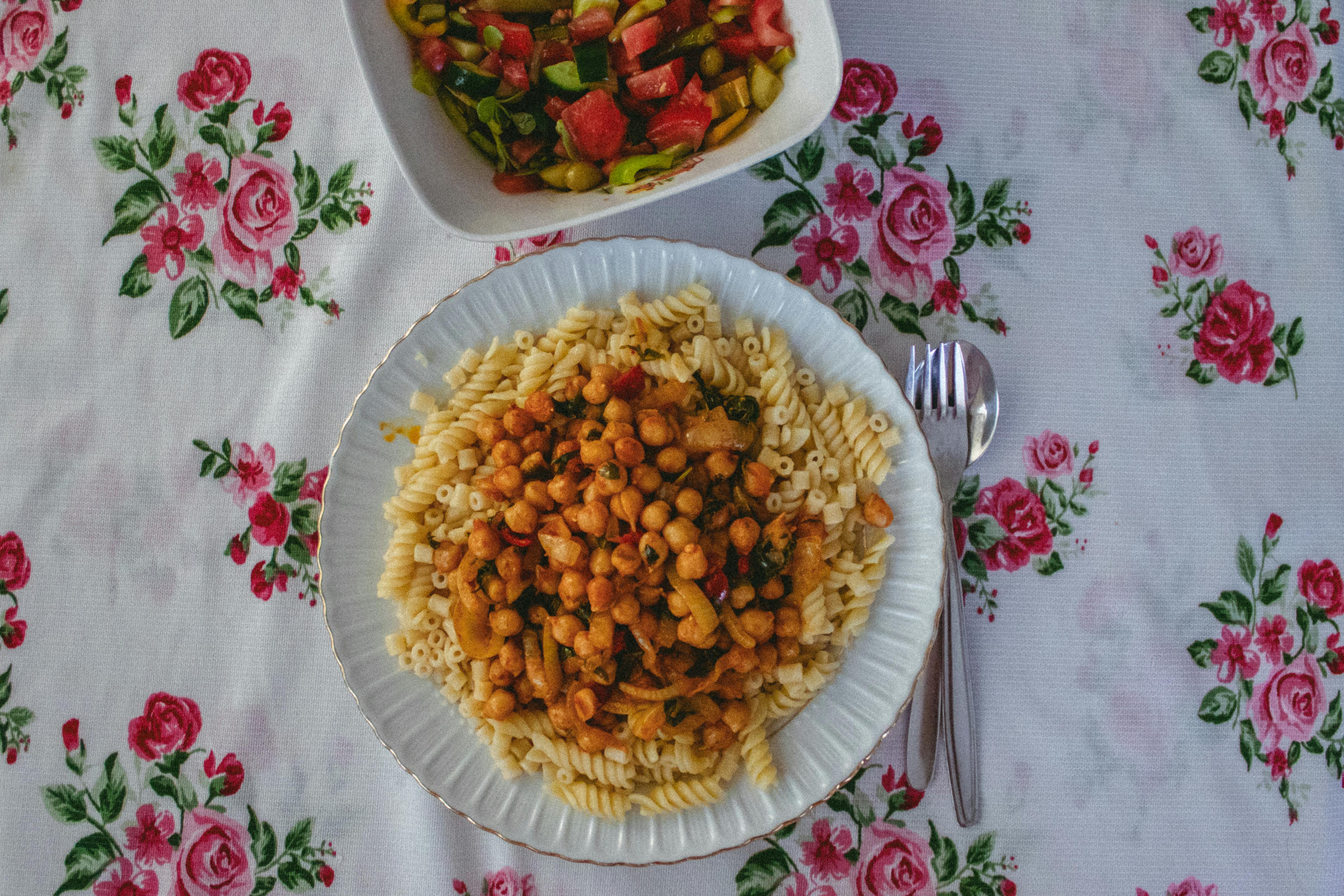 Canned Chickpeas In A Kitchen Setting With A Salad And Stew Preparation