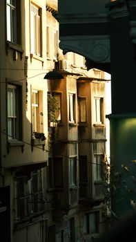 Charming old city buildings basked in warm autumn sunlight.