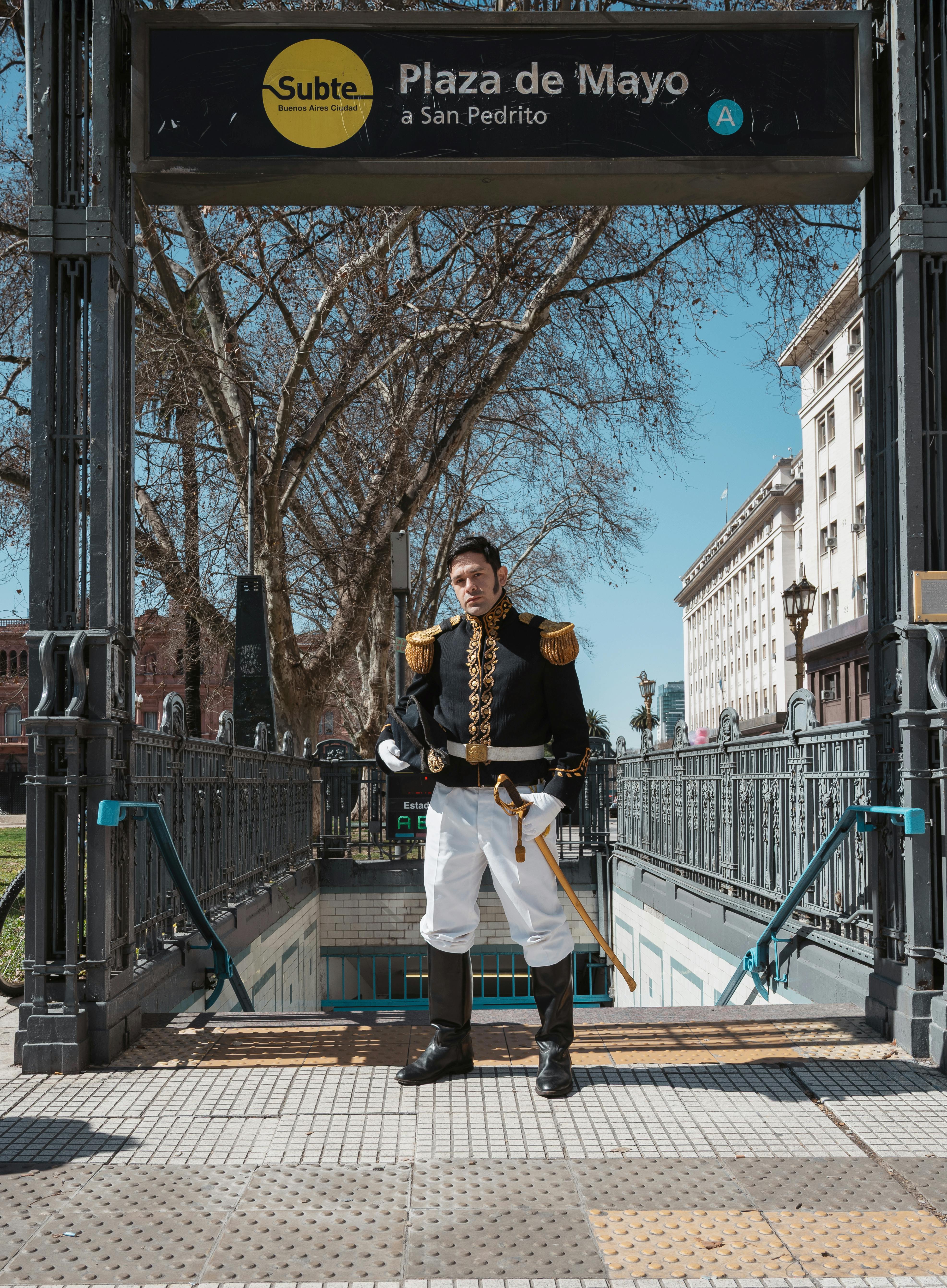 Person in historical costume by Plaza de Mayo entrance in Buenos Aires, Argentina.
