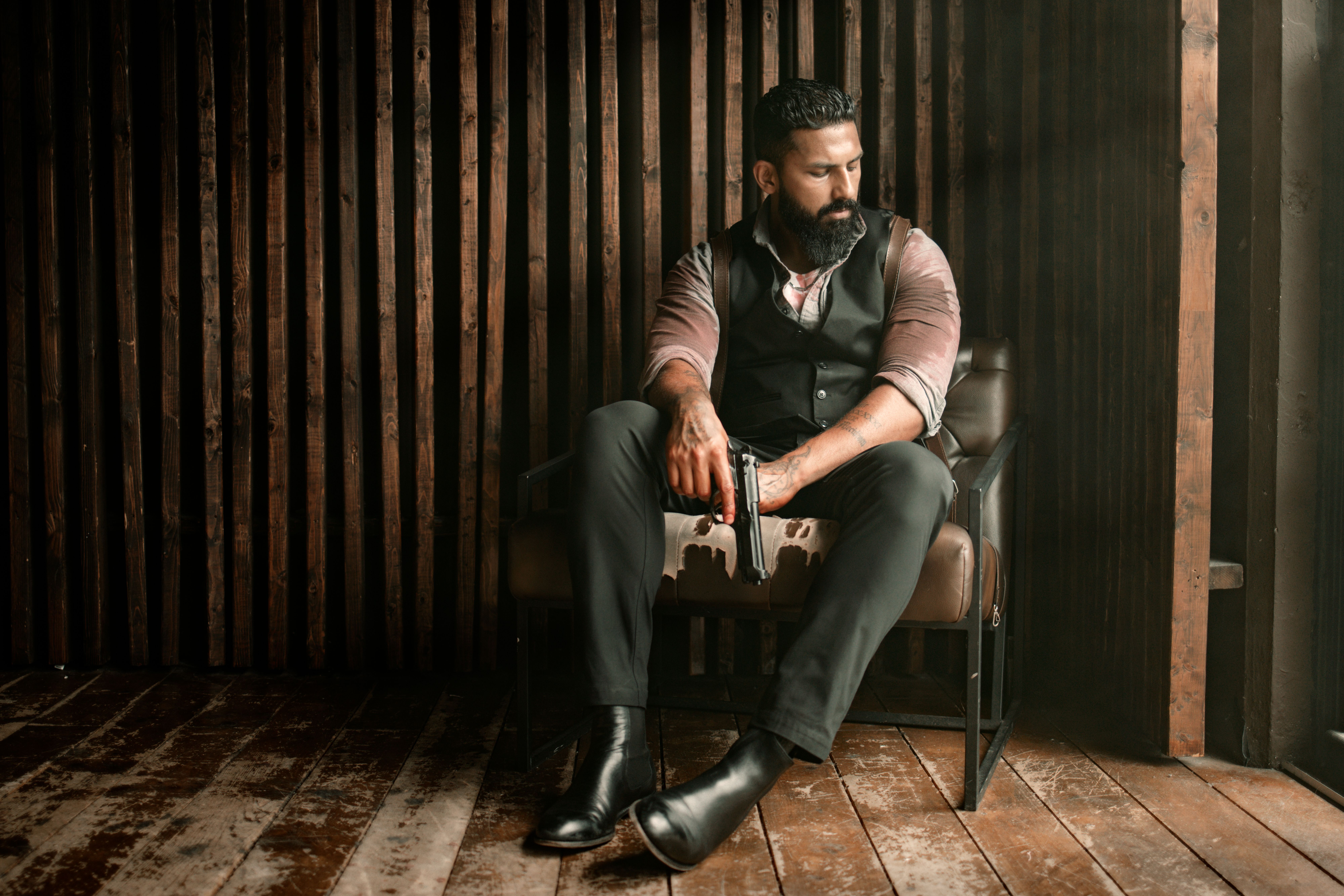 Bearded man in classic waistcoat vest rustic style