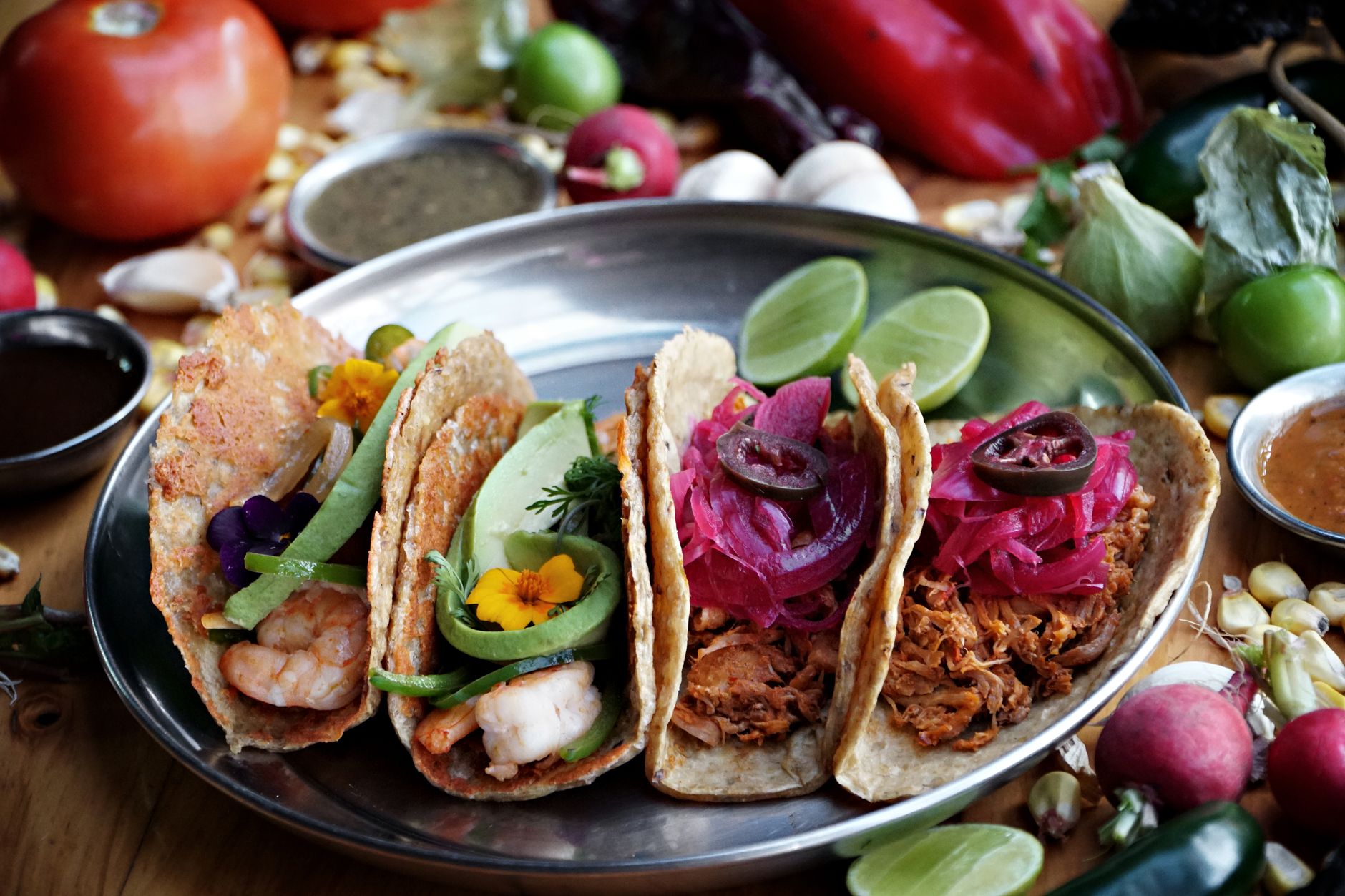 Close-up of taco shell with seasoned beef and vegetables