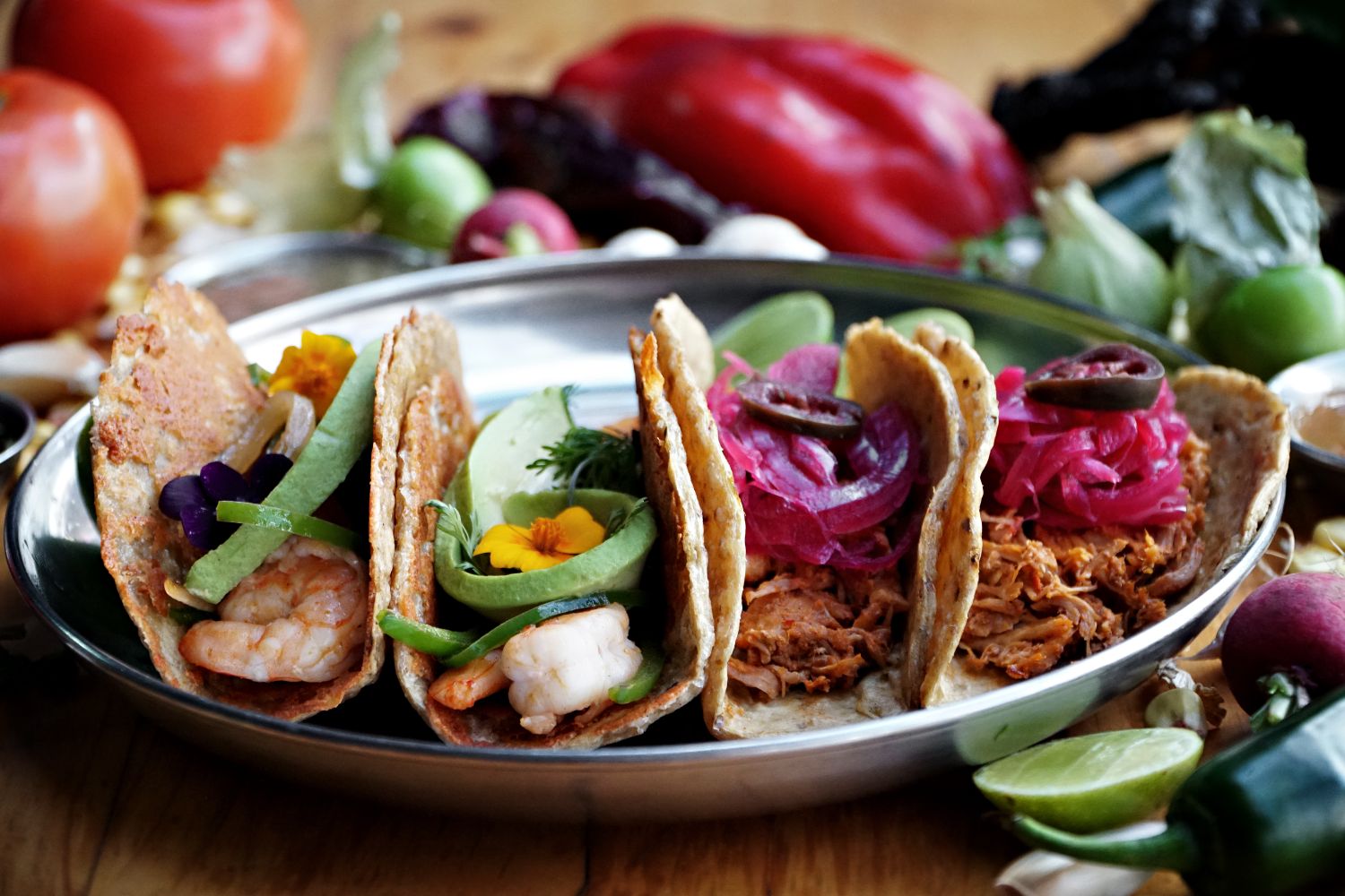 Sizzling tacos on the plancha at El Fuego