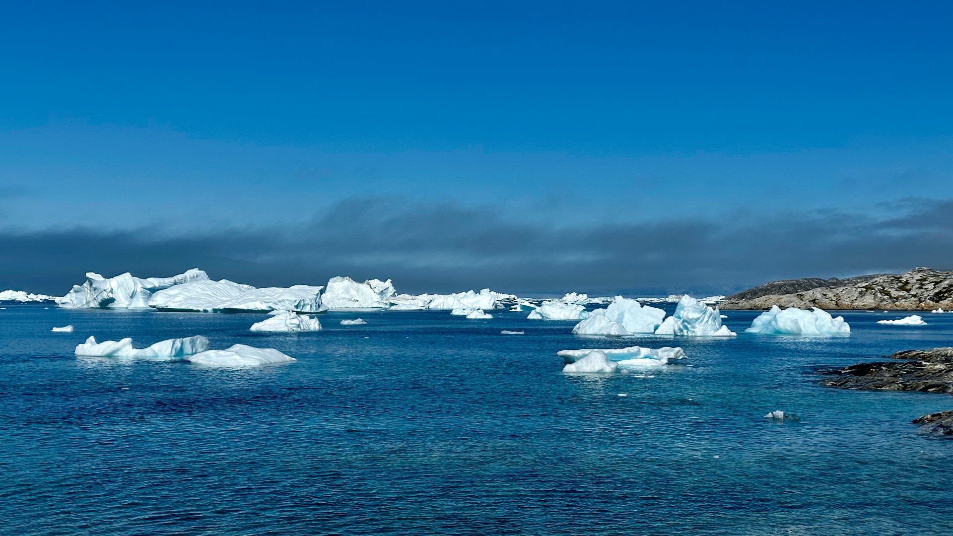 Ilulissat Icefjord Guide: The Calving Glacier, Midnight Sun, and Whale Watching in Disko Bay