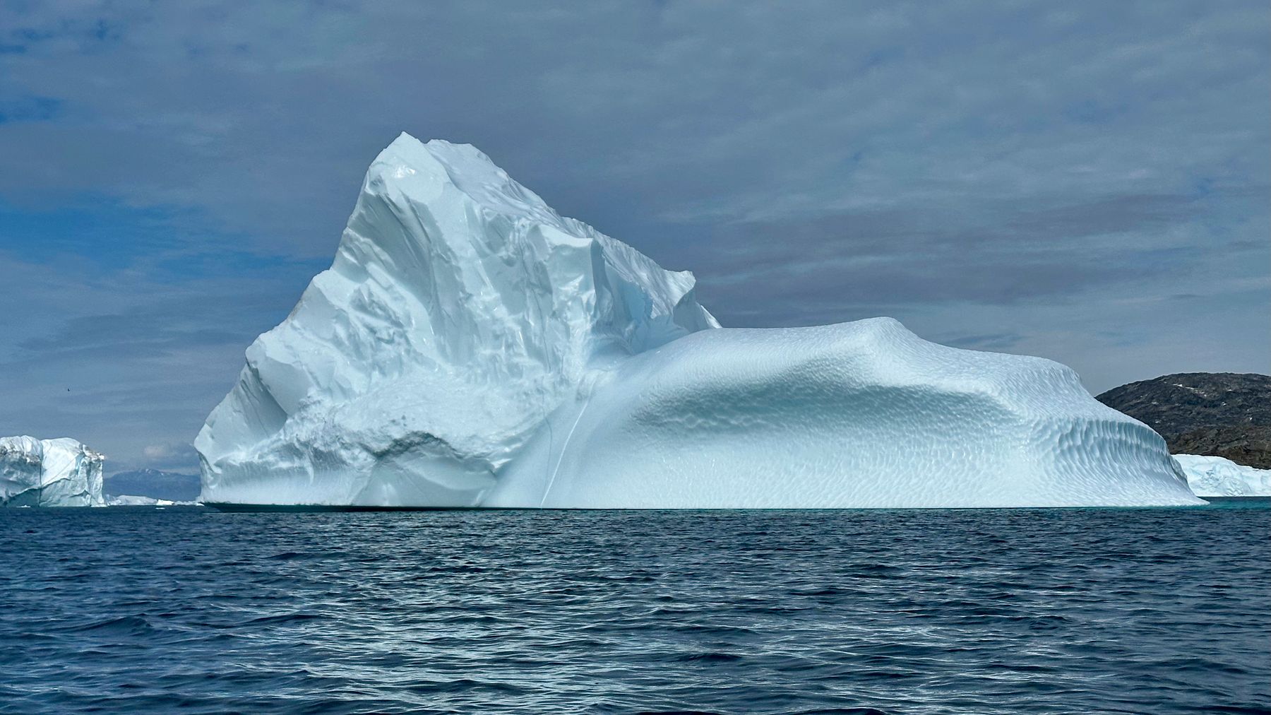 Large iceberg floating in Greenland waters