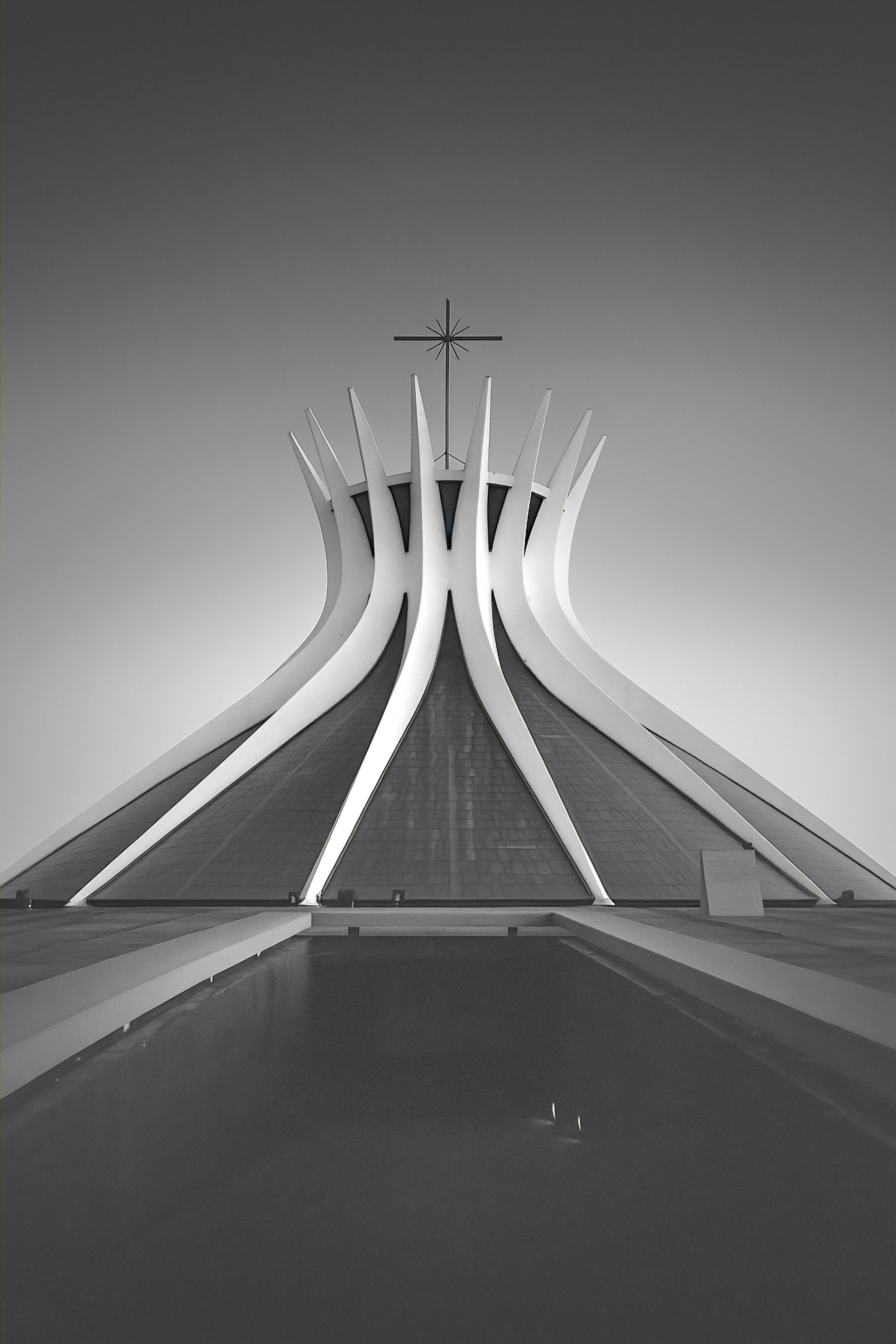 A striking view of Brasília's Cathedral with unique design in monochrome, showcasing modern architectural brilliance.