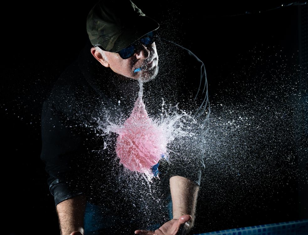 Dynamic Water Balloon Explosion Captured Mid-Air · Free Stock Photo