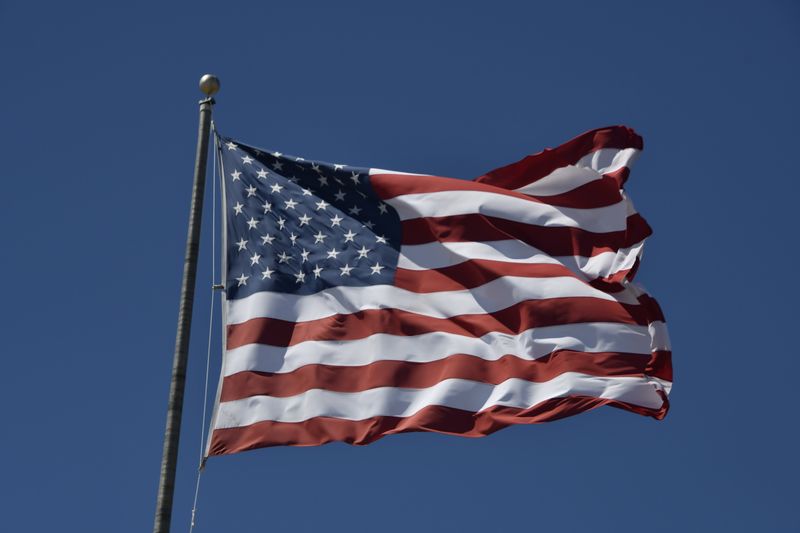 American Flag on Pole Under Blue Sky during Daytime · Free Stock Photo