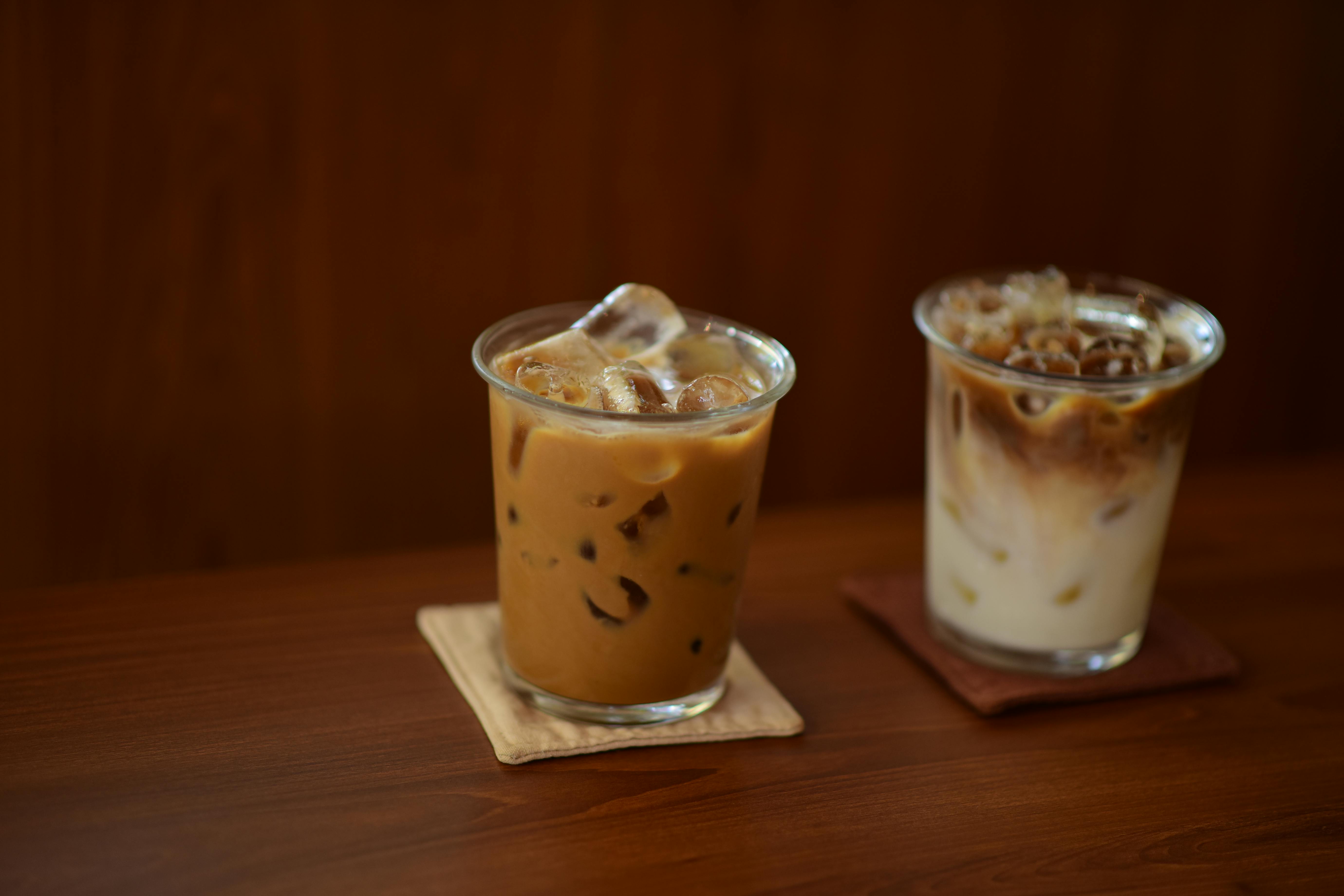 Disposable Drink Coasters Made Of Cardboard Or Cork On A Coffee Table