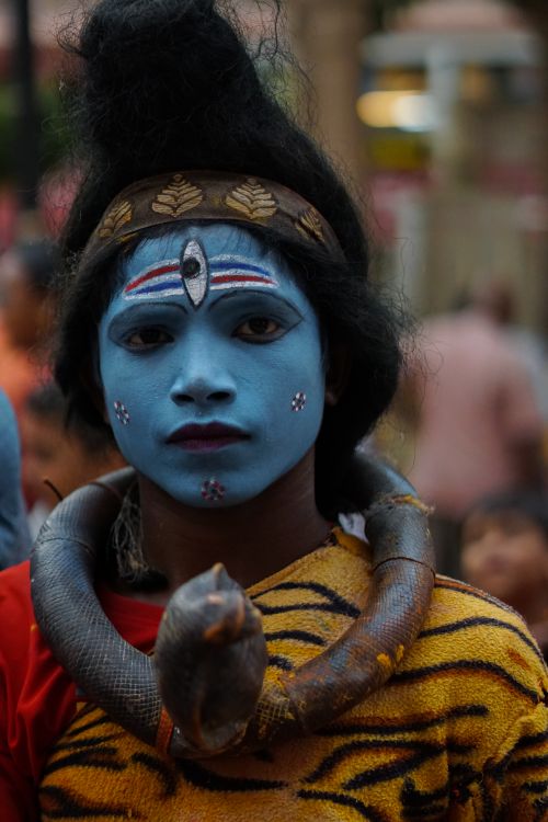 Free A vibrant portrayal of a Shiva devotee with face paint and costume in Varanasi, India. Stock Photo